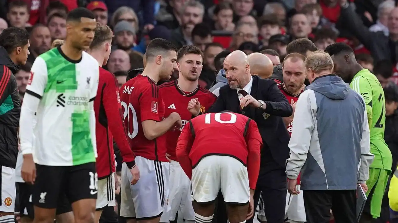 Manchester United manager Erik ten Hag delivers a team talk against Liverpool