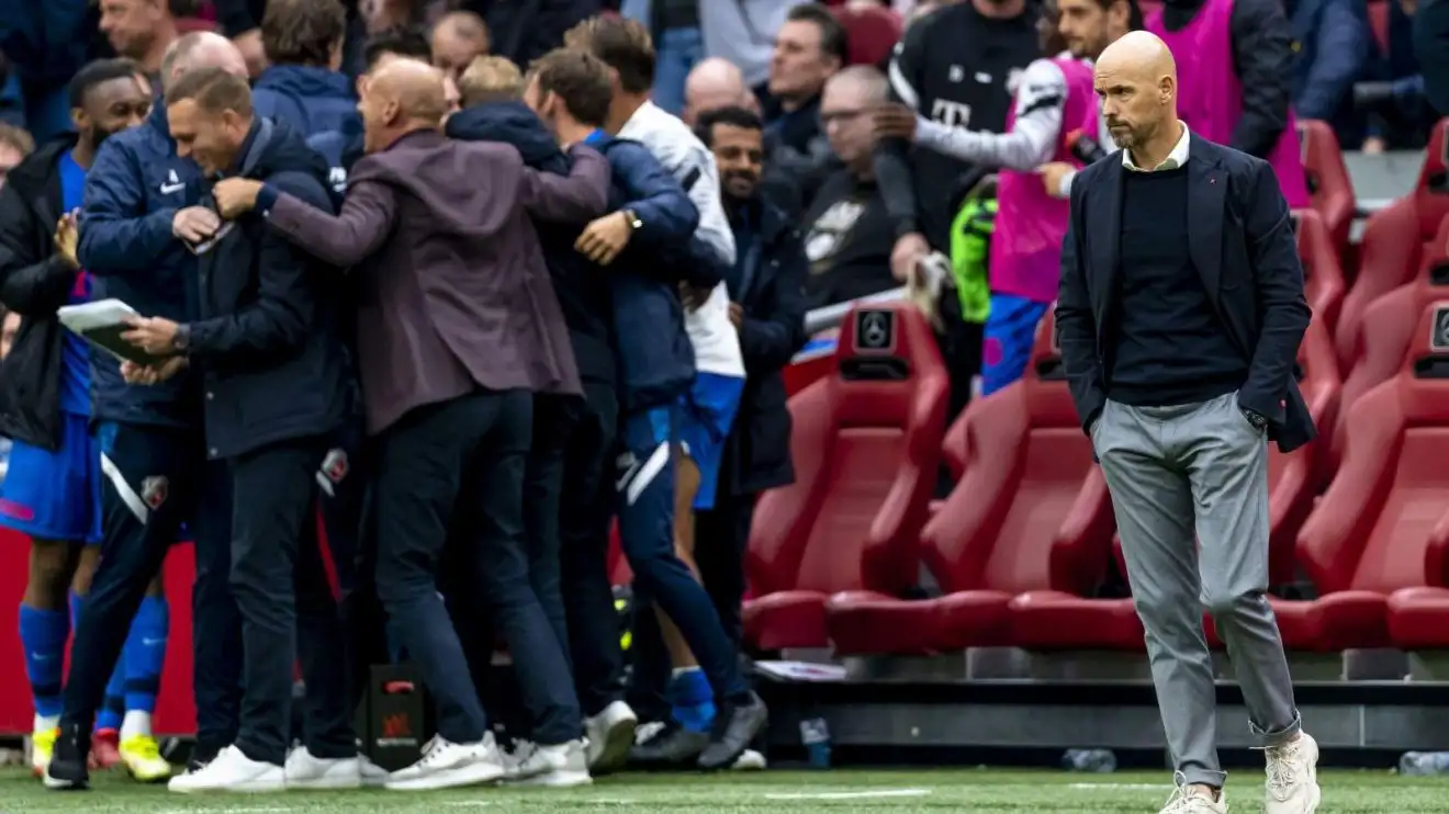 Male Utd supervisor Erik ten Hag appearances dejected as a team celebrates