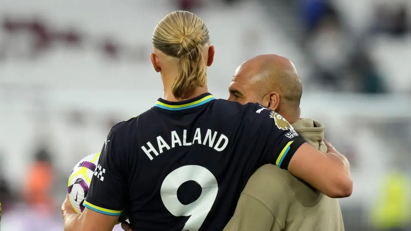 Tiền đạo Man City Erling Haaland và Pep Guardiola