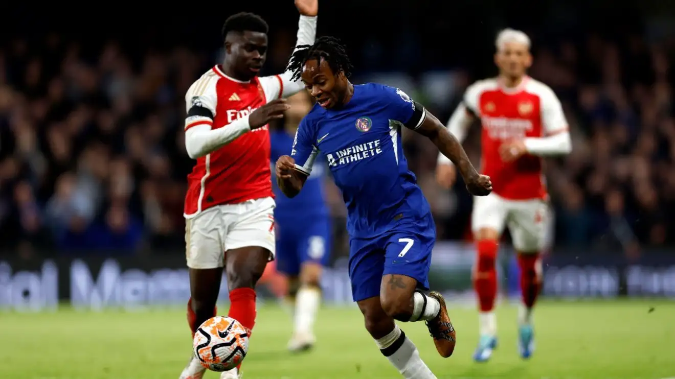 Assortment winger Bukayo Saka confronts Raheem Sterling