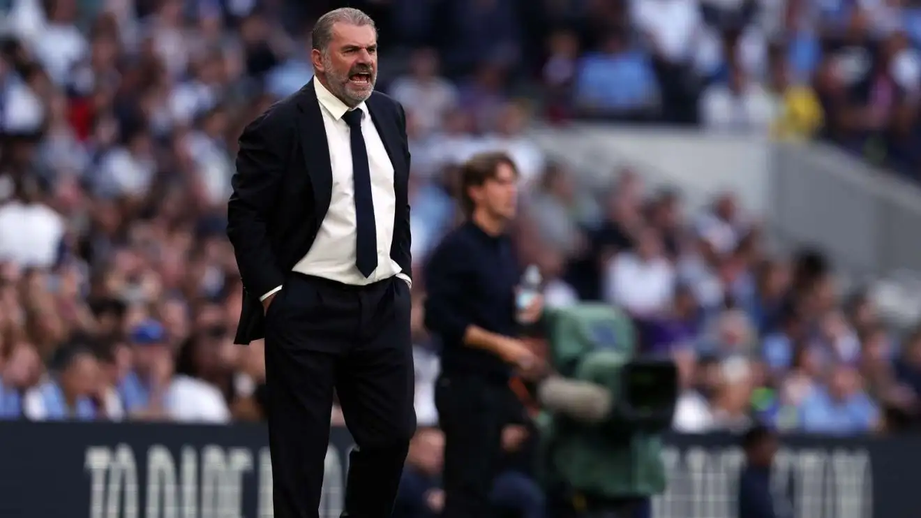 Tottenham head businesslike Ange Postecoglou yells at his junior during a match