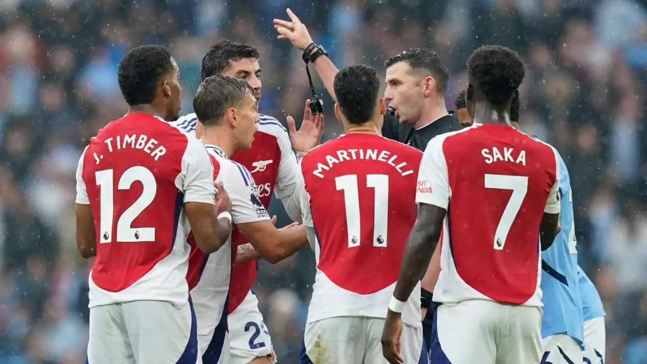 Michael Oliver sending off Leandro Trossard