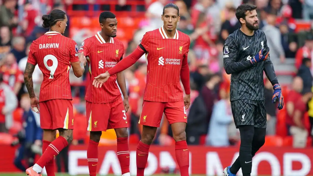 Liverpool players Alisson and Virgil van Dijk bemoan after conceding a impartial