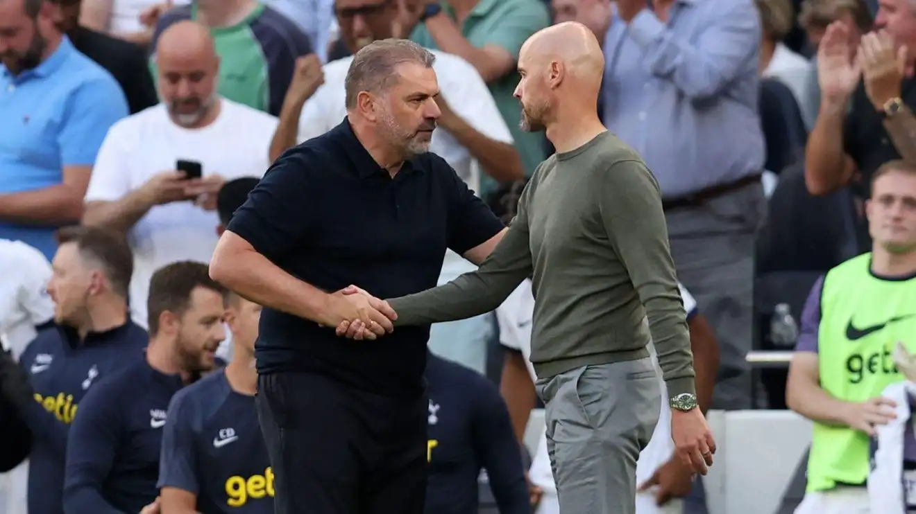 Spurs manager Ange Postecoglou shakes hands with Manchester United coach Erik ten Hag