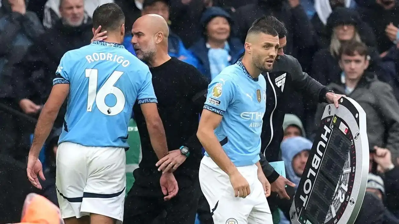 Pep Guardiola consoles Rodri