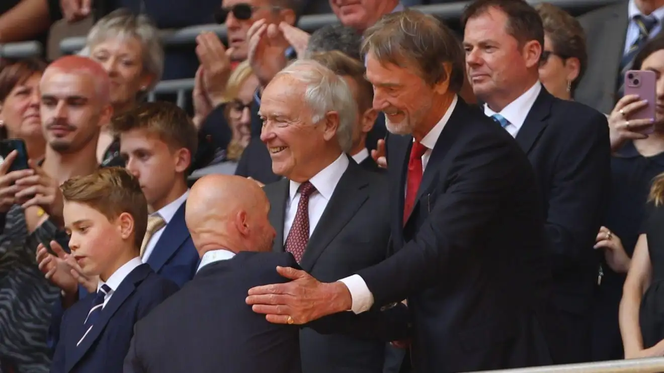 Manchester United coach Erik ten Hag embraces part-owner Sir Jim Ratcliffe