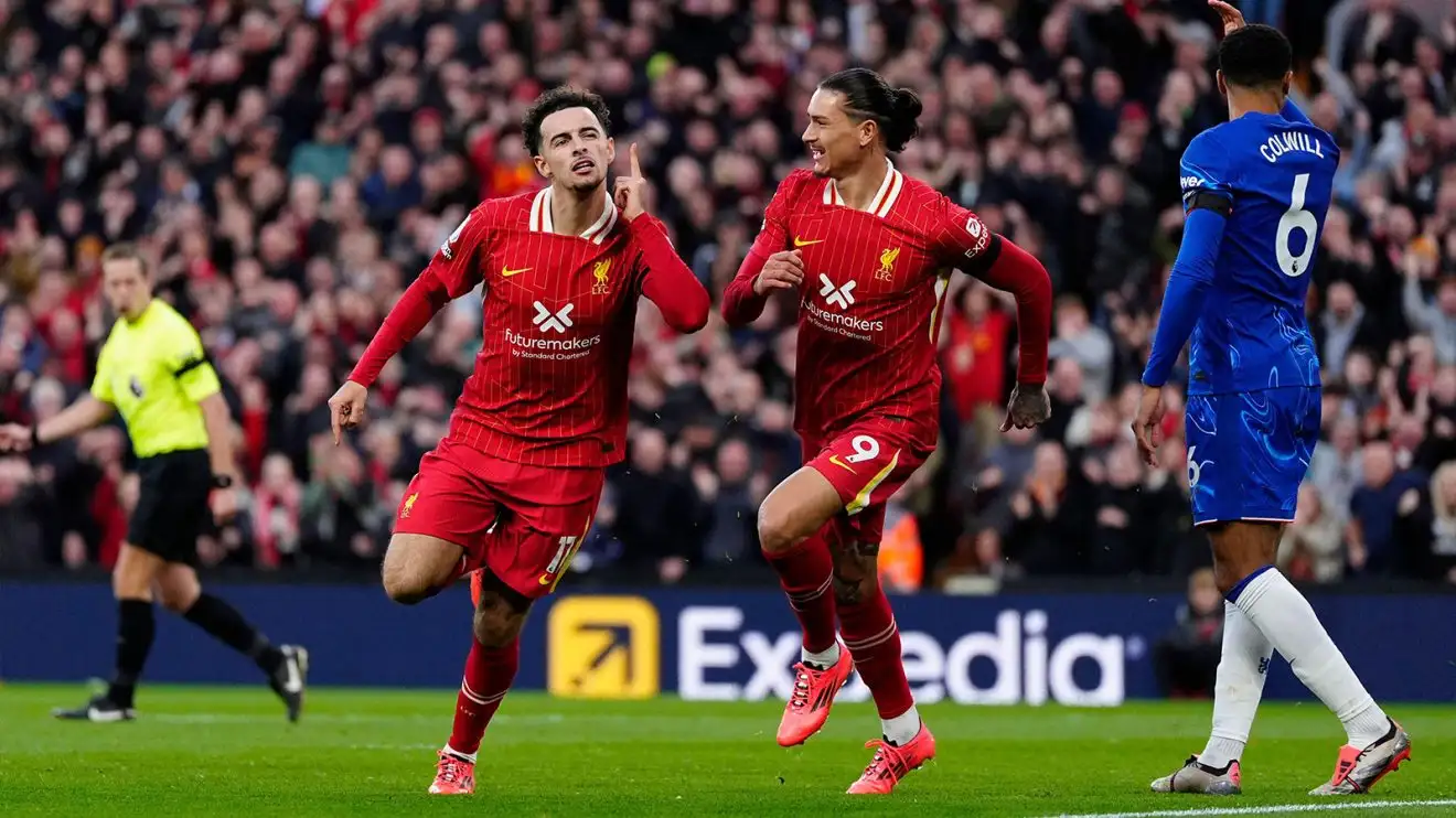 Curtis Jones wheels away with Darwin Nunez celebrating his goal while Levi Colwill looks dejected in the background