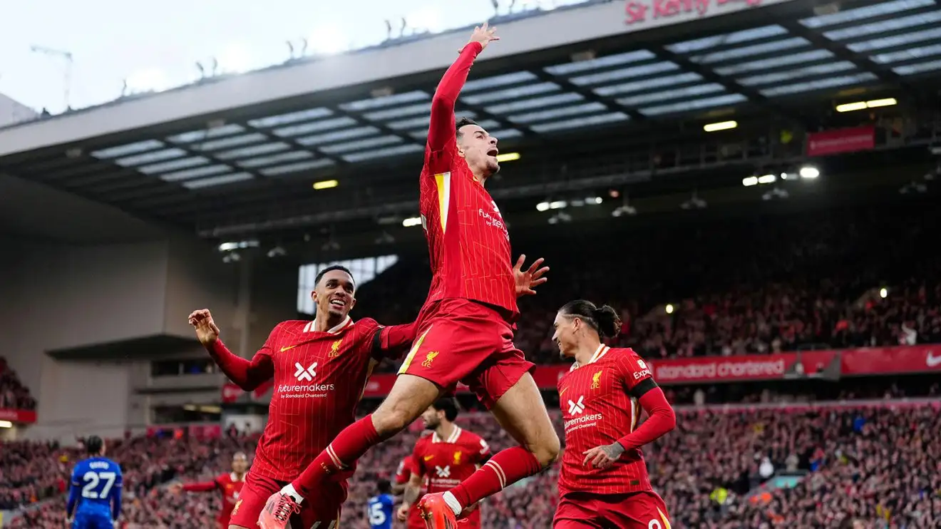 Liverpool's crucial intangibles credited for ensuring victory over promising Chelsea 1 Curtis Jones jumps in the atmosphere in party, flanked by teammates, while Chelsea players trudge away