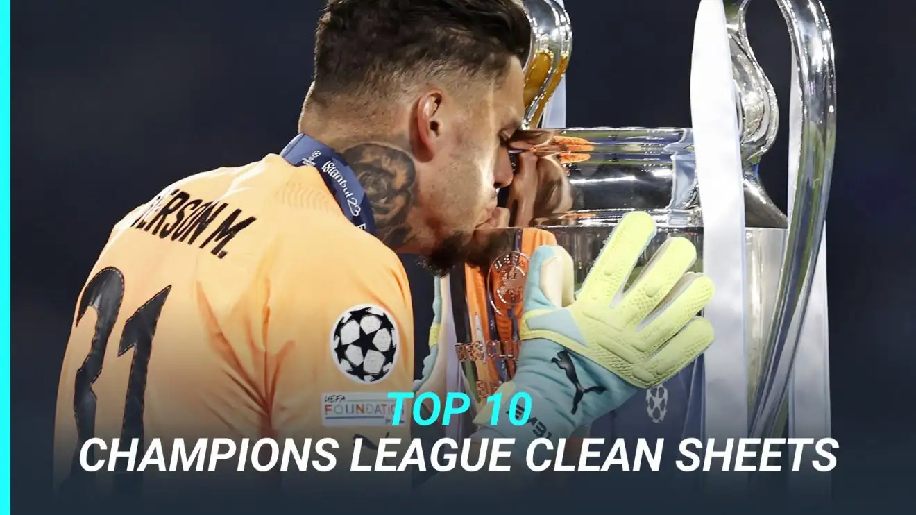 Ederson kisses the Champions League trophy