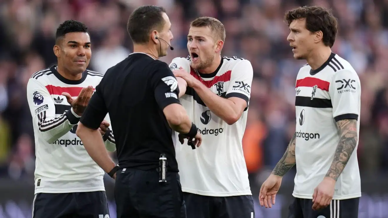Manchester United players Casemiro, Matthijs de Ligt and Victor Lindelof appeal to the referee