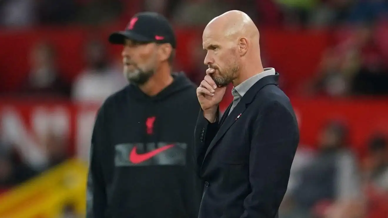 Manchester United manager Erik ten Hag with Liverpool coach Jurgen Klopp in the background
