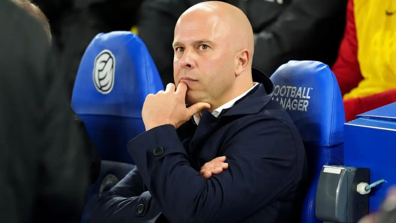Liverpool head coach Arne Slot on the bench before a match