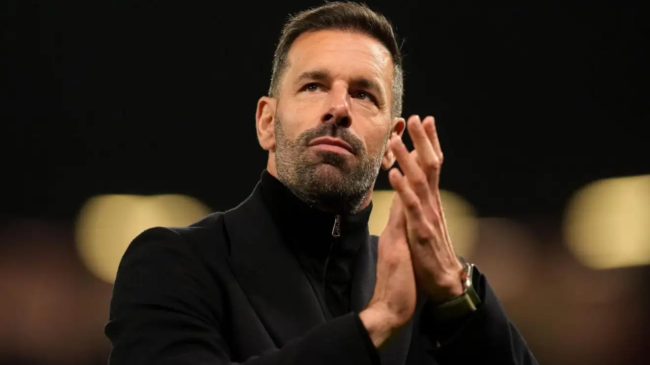 Interim Man Utd manager Ruud van Nistelrooy applauds the fans