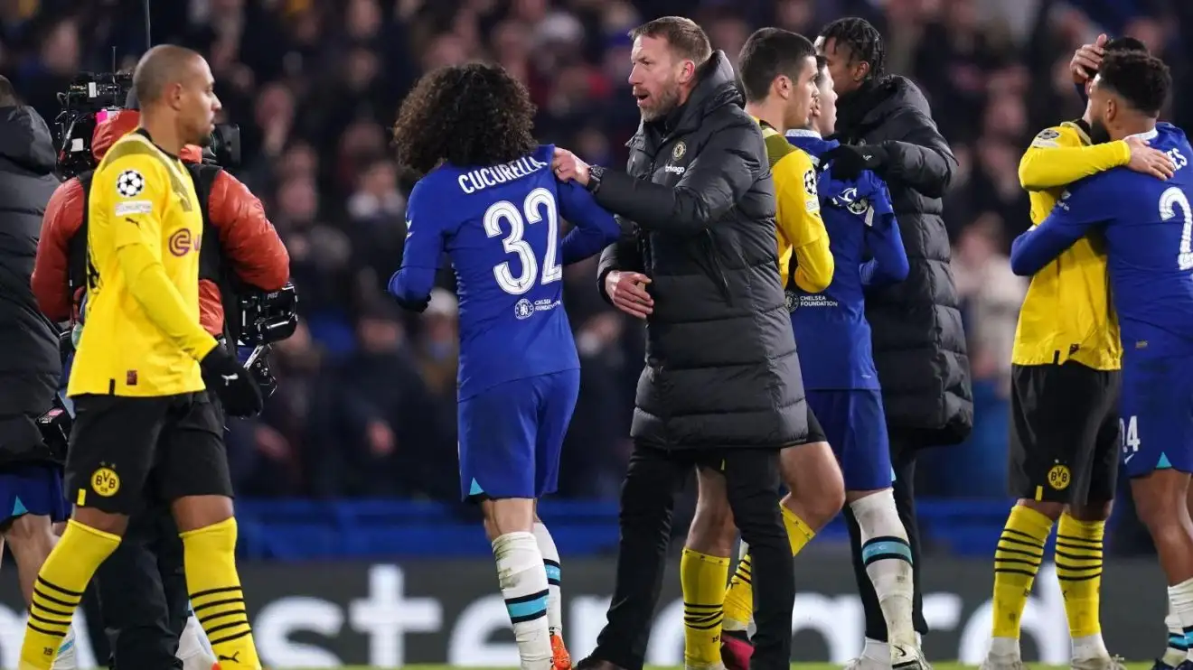 Previous Chelsea head train Graham Potter and Marc Cucurella after a suit