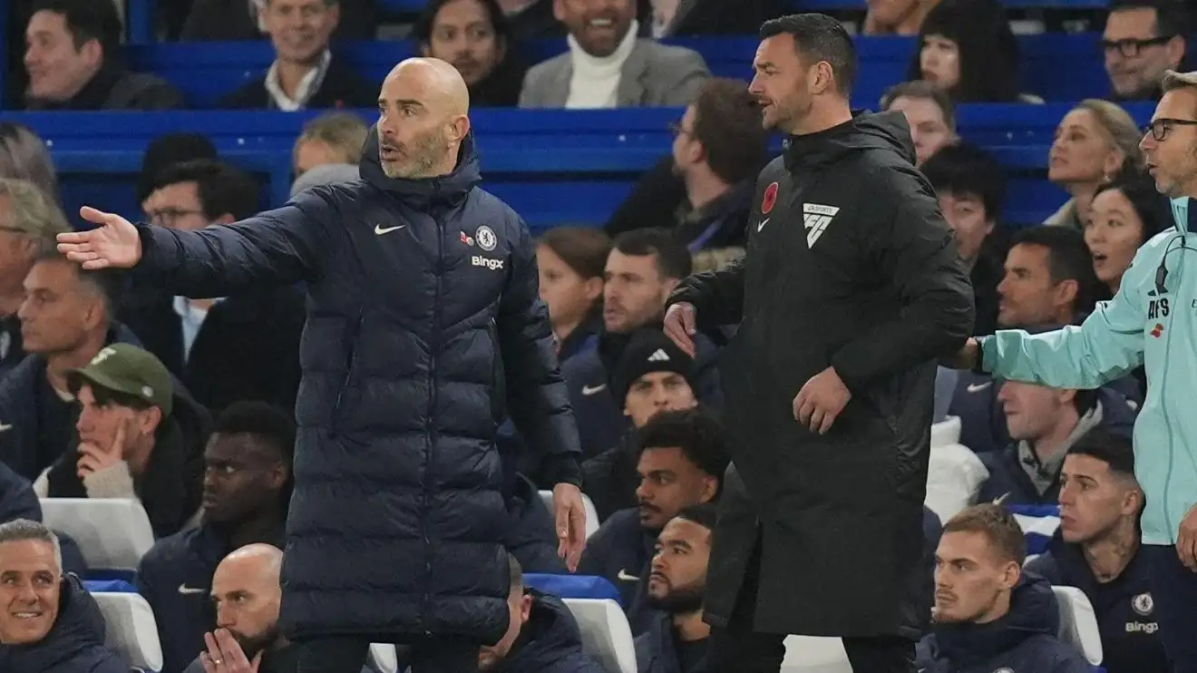Chelsea head coach Enzo Maresca argues with the fourth official