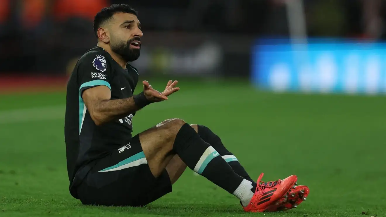 Liverpool forward Mohamed Salah protests to the referee