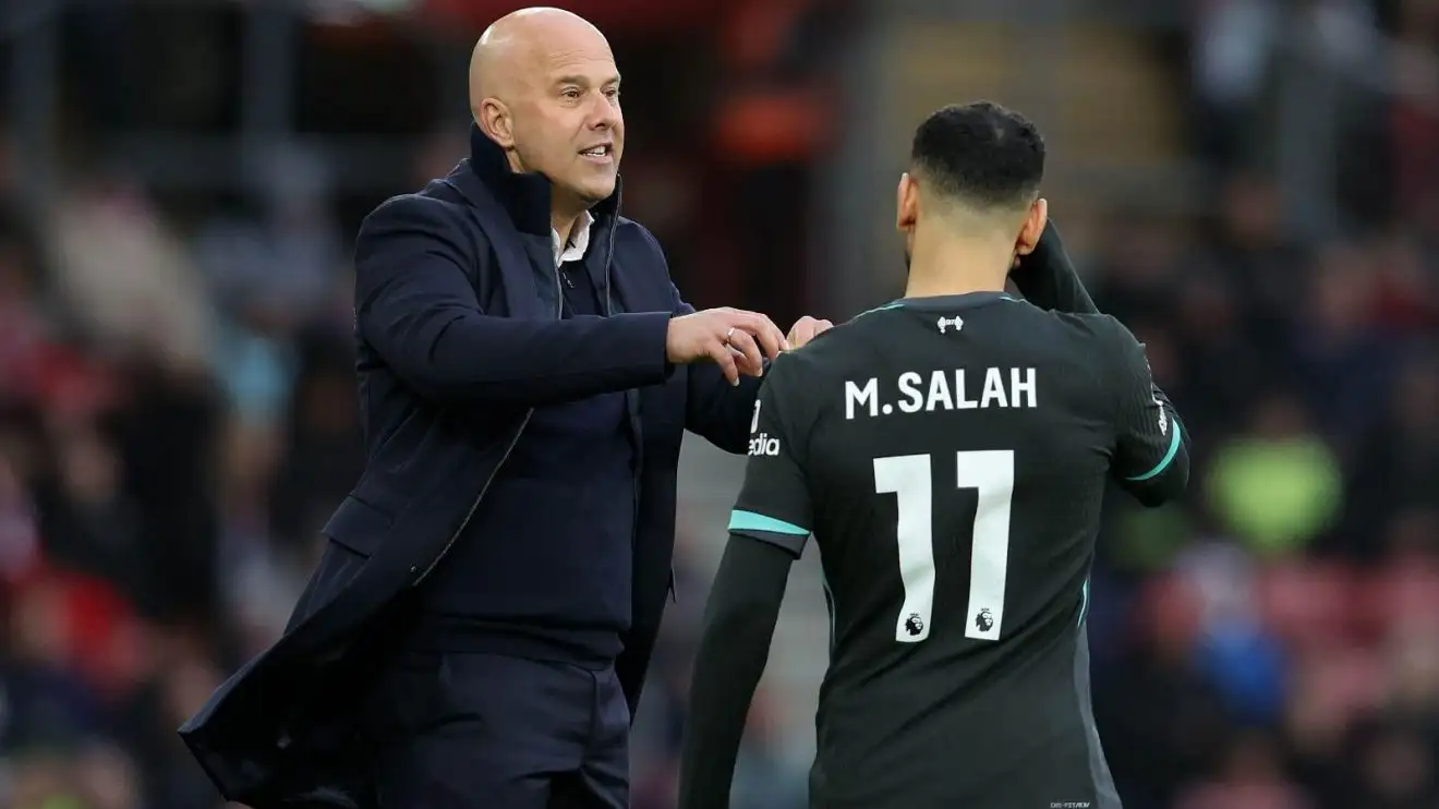 Liverpool: Slot 'jokes' Salah 'knows more about 115 charges' against City after 'last game' comment 1 Arne Adapter and Mohamed Salah durng a match
