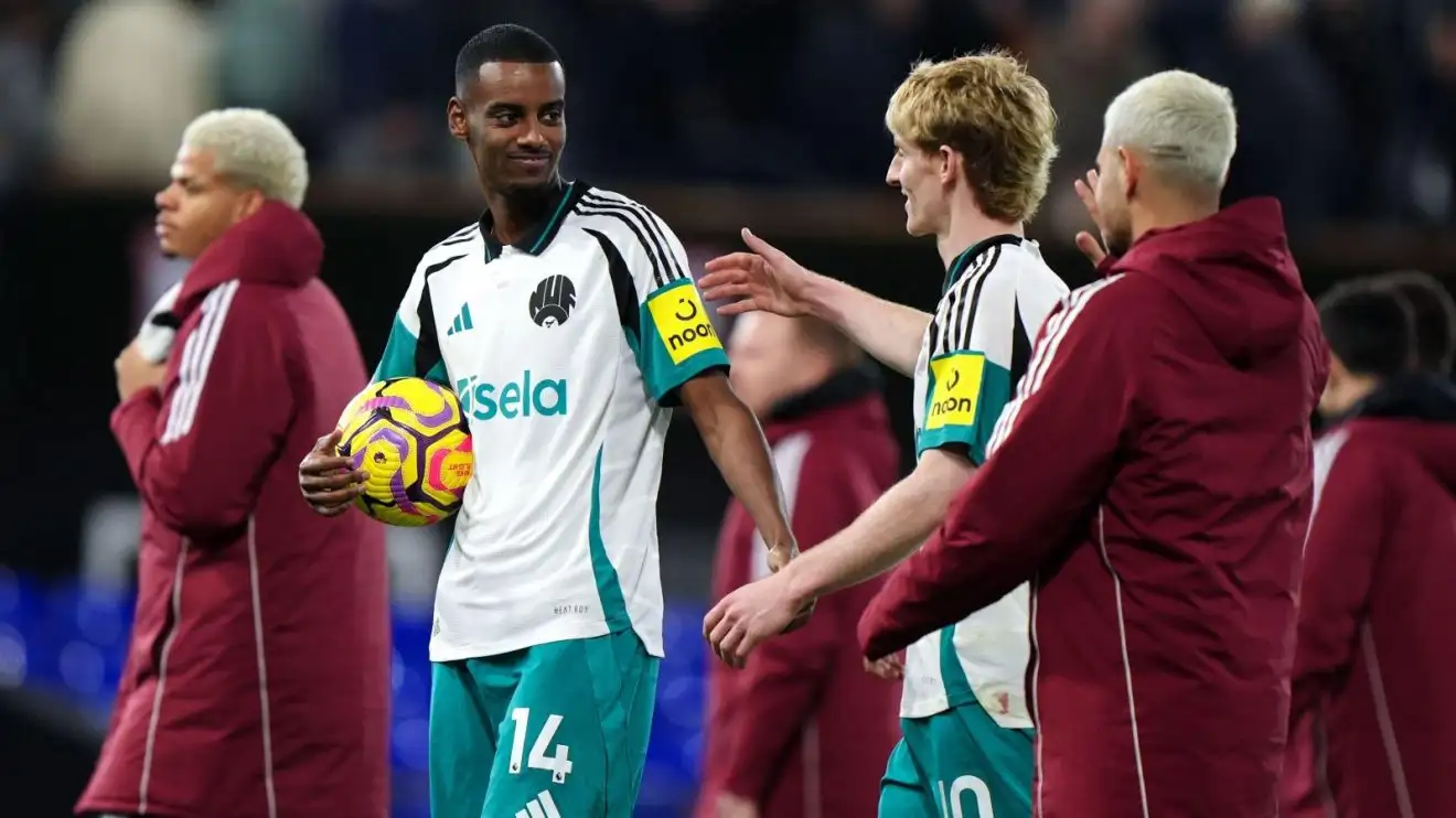 Newcastle striker Alexander Isak celebrates with Anthony Gordon after his hat-trick