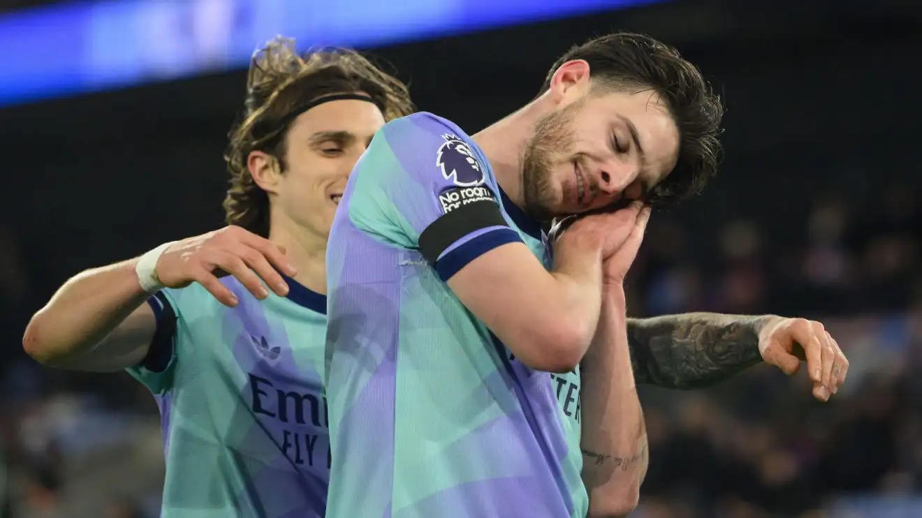 Arsenal player Declan Rice celebrates his goal with Riccardo Calafiori