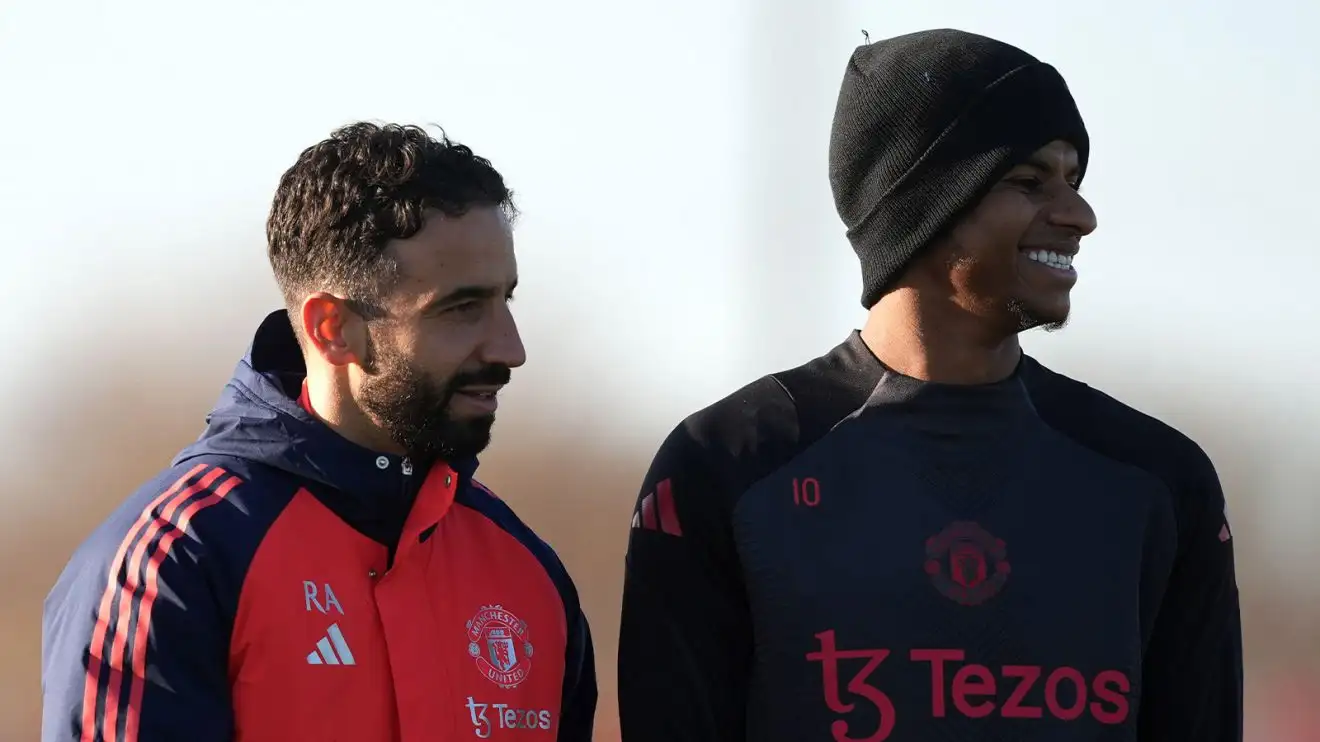 Ruben Amorim and also Marcus Rashford share a laugh on the Manchester United training headway