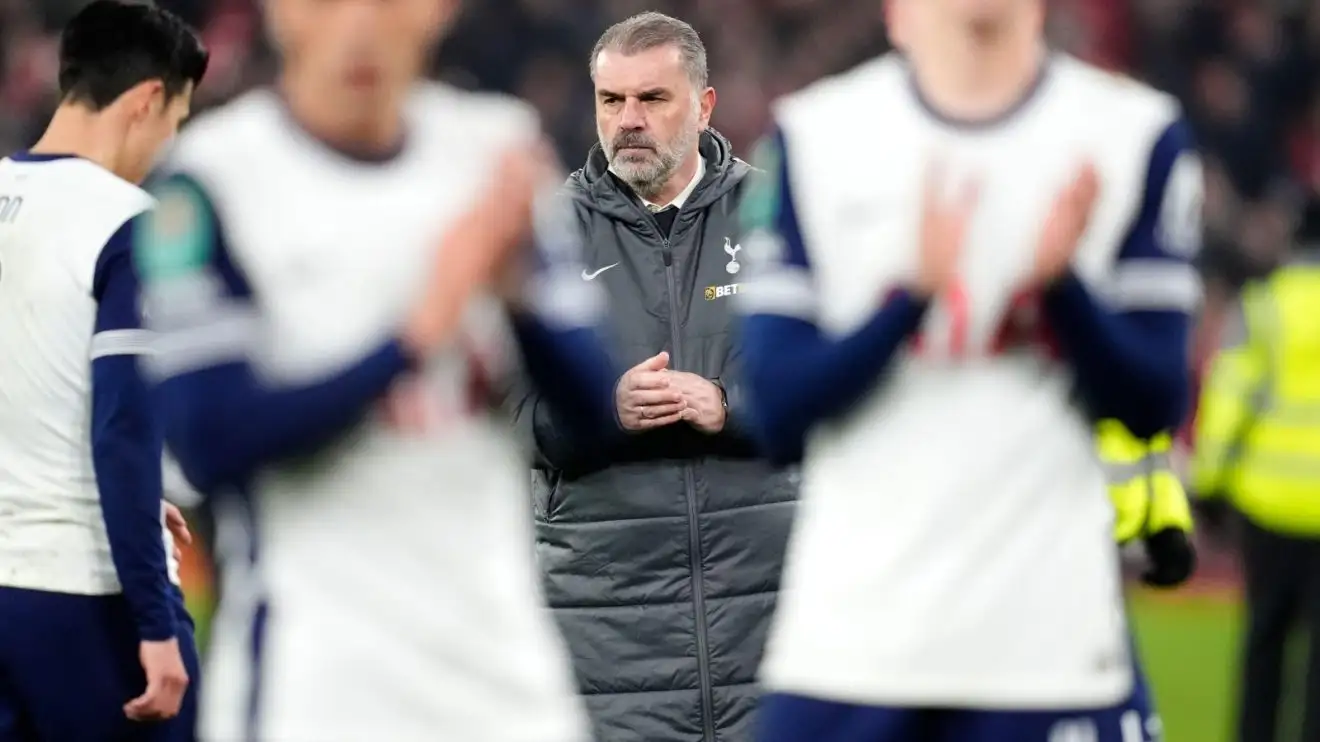 Tottenham head coach Ange Postecoglou claps the fans after a match