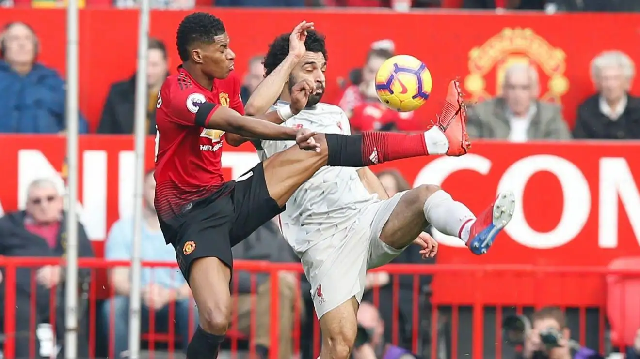Liverpool warned over Salah contract 1 Manchester United forward Marcus Rashford contends for the ball with Liverpool striker Mo Salah