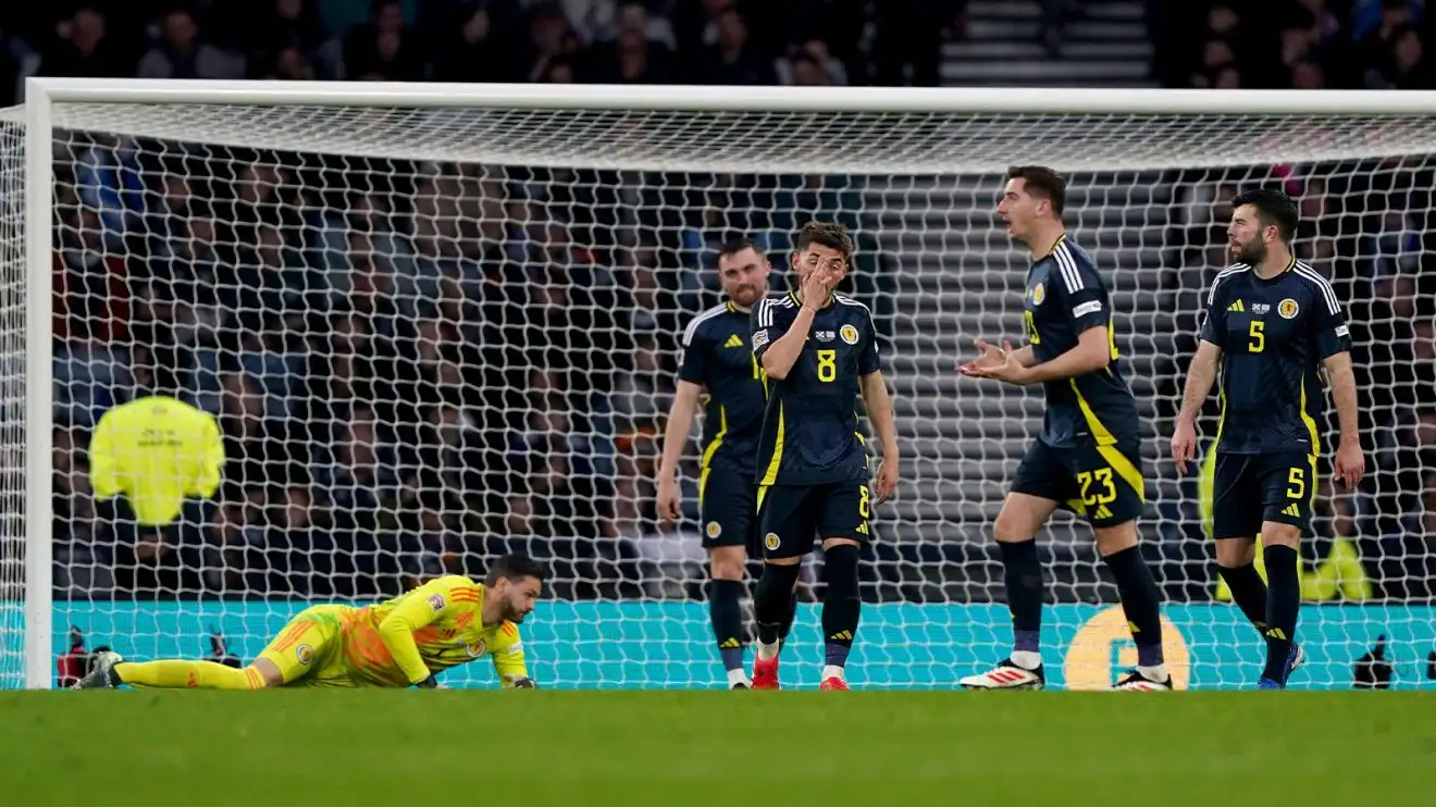 Scotland players look dejected after conceding against Greece