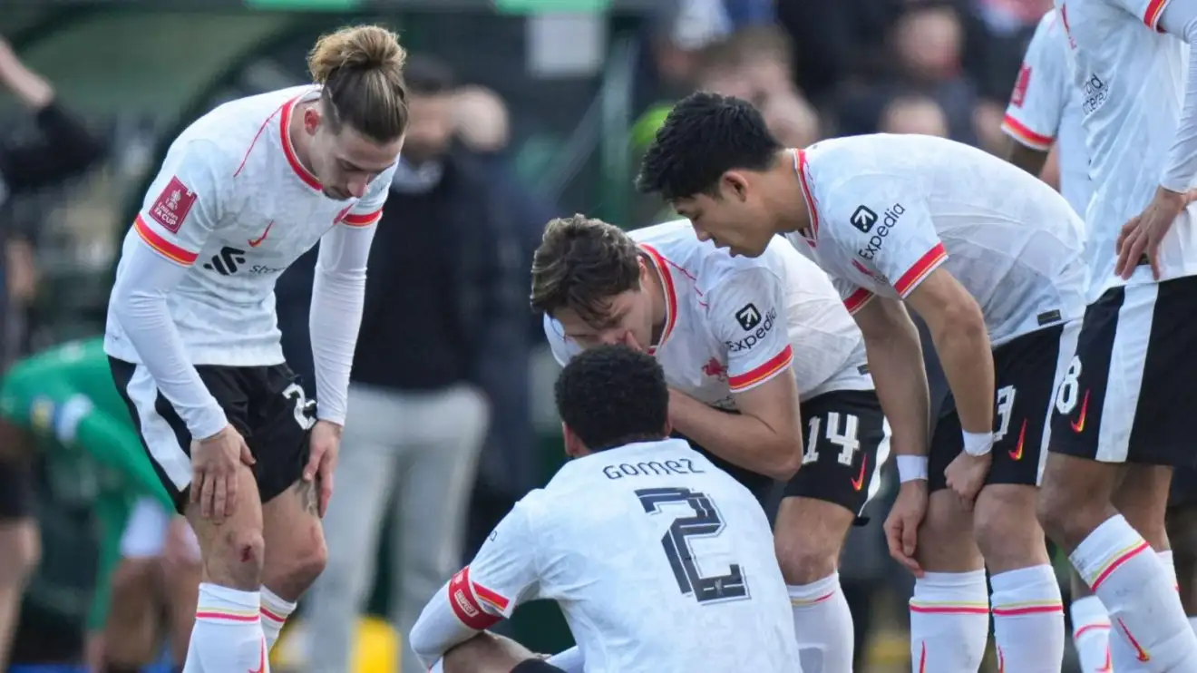 Liverpool 'warned' who they 'must replace' amid fears over liability 1 Liverpool gamers encircle Joe Gomez after the protector endures an injury
