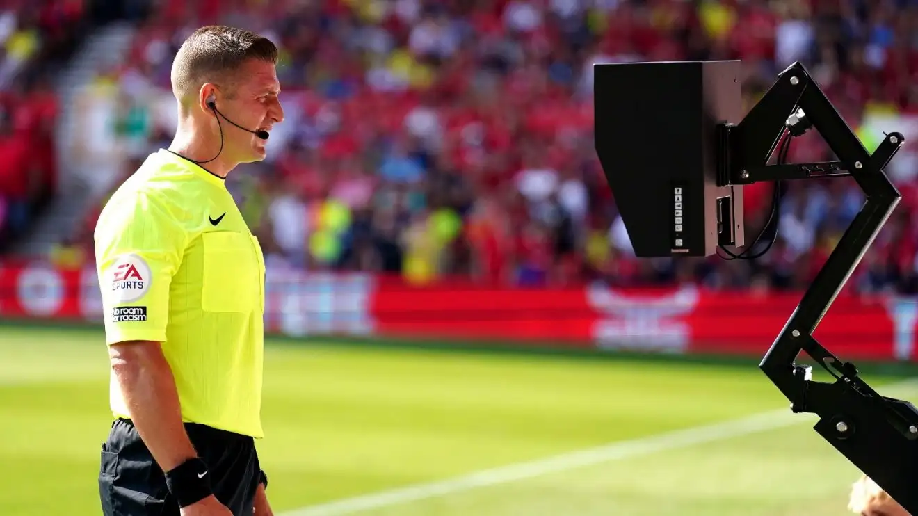 UEFA hits out at 'no go' VAR changes with 'hard to tolerate' proposals 1 A referee appearances at the VAR monitor.