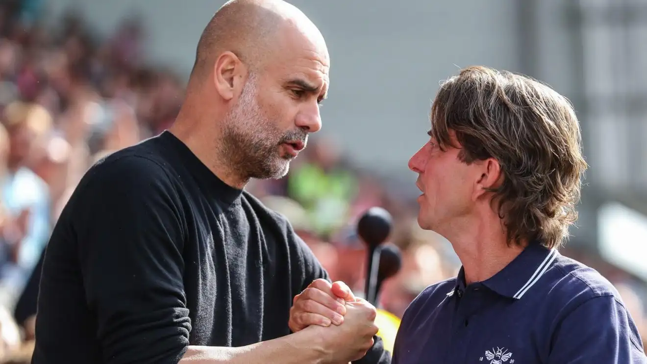 Man City 'reject' £60m bid from Spurs for Savinho 1 Male City supervisor Pep Guardiola trembles hands by means of Brentford's Thomas Frank