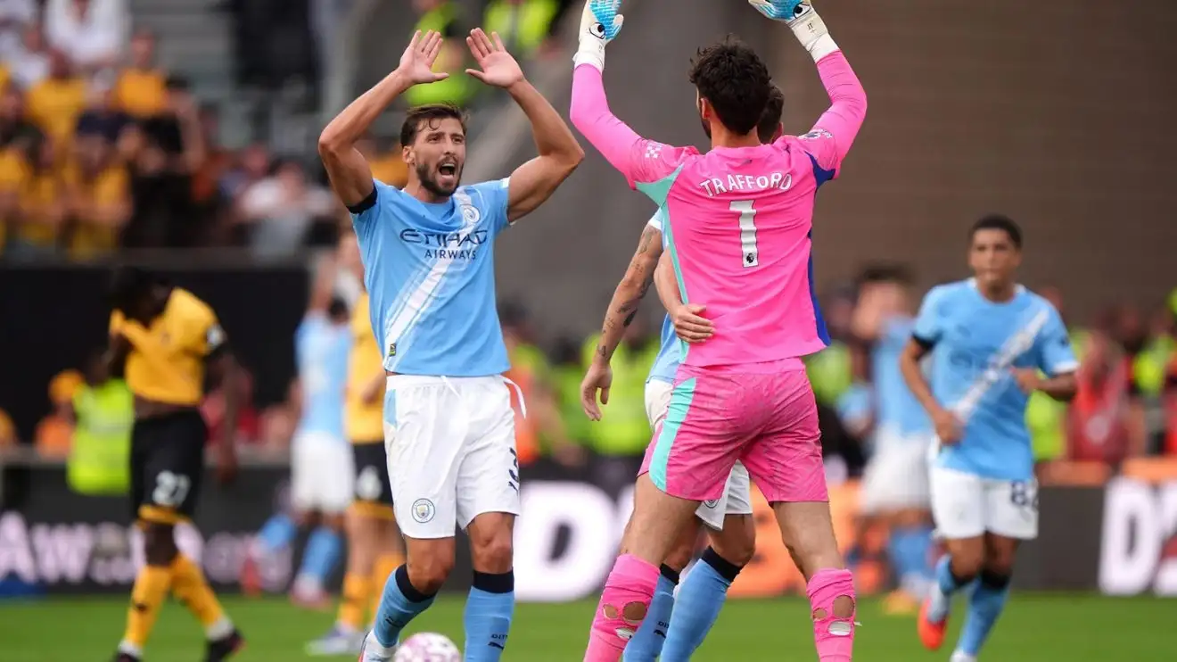 Ruben Dias extends Man City stay until 2029 to ‘win more trophies’ in ‘special place’ 1 Ruben Dias high fives James Trafford as Individual City overcome Wolves 4-0