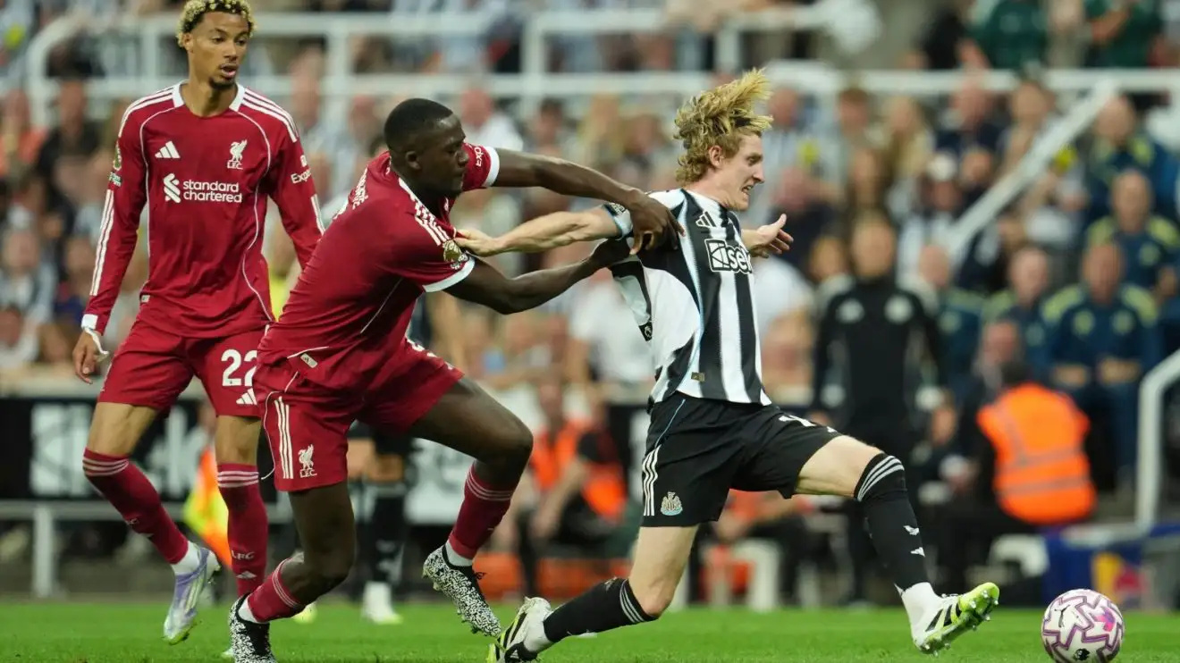 Liverpool urged to sell 'pants' Konate 1 Ibrahima Konate tries to grasp Anthony Gordon