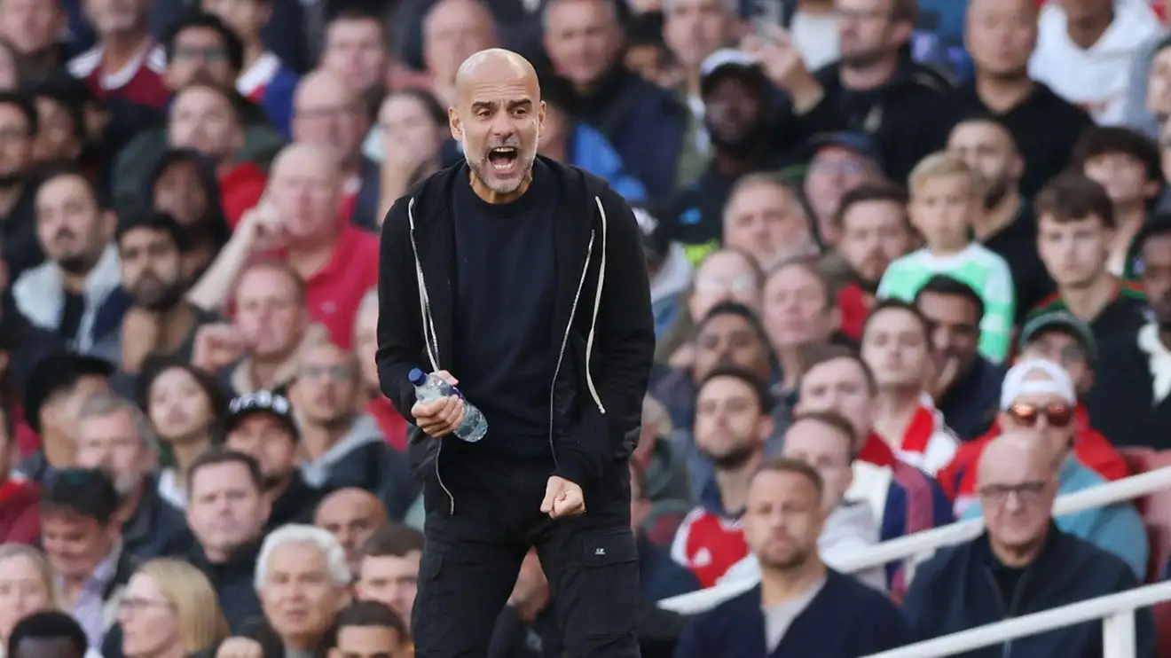Pep Guardiola on the touchline away to Arsenal
