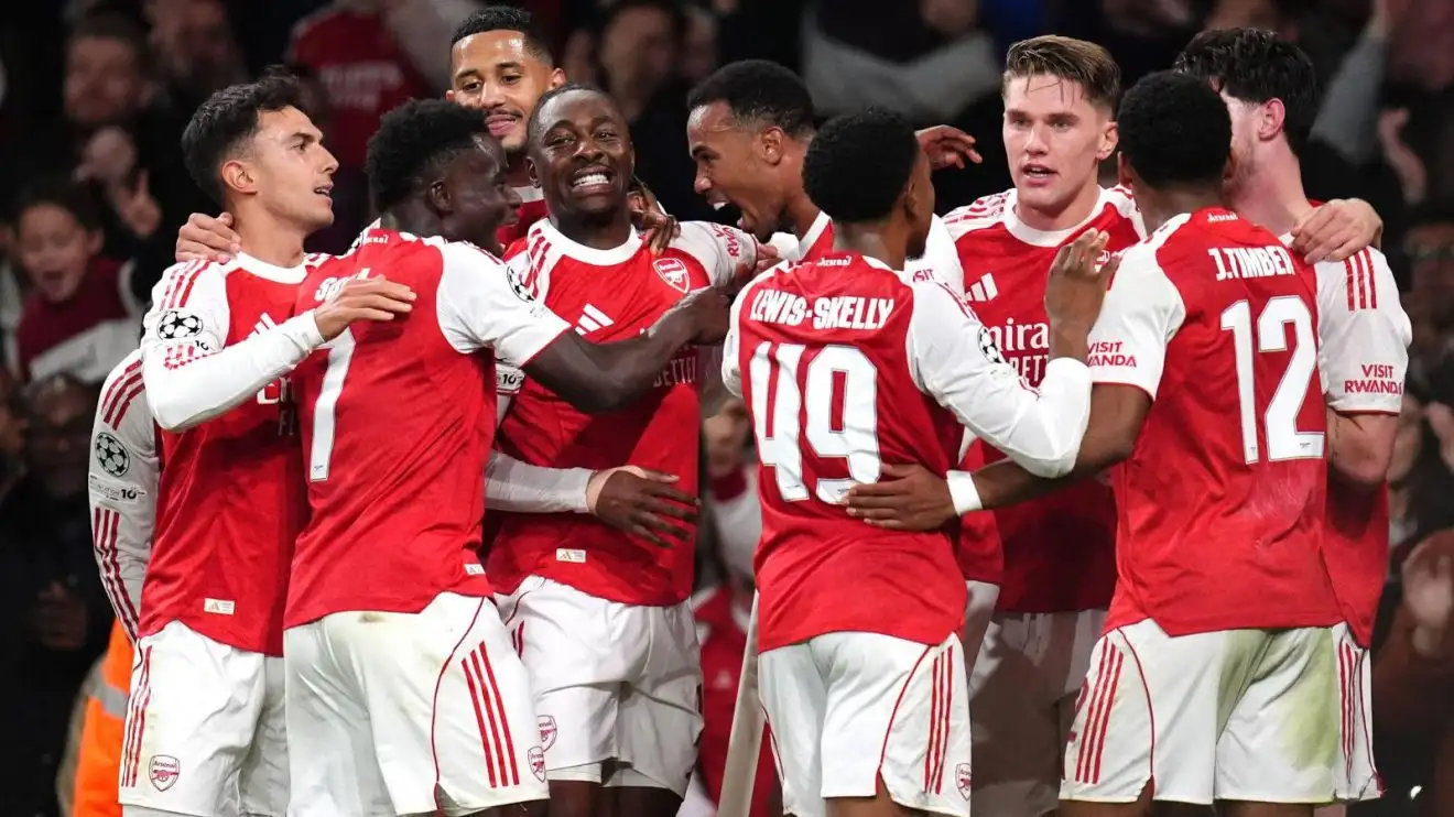 Arsenal players celebrate a goal