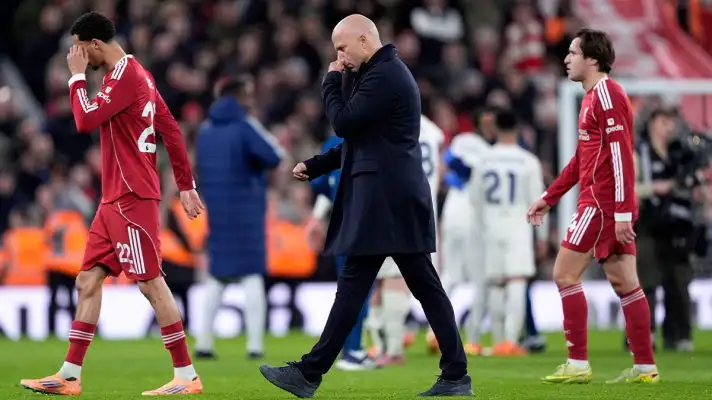 Arne Slot walks off looking dejected following Liverpool's 3-0 home defeat to Nottingham Forest