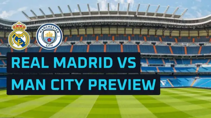 Real Madrid and Manchester City badges on a backdrop of the Bernabeu