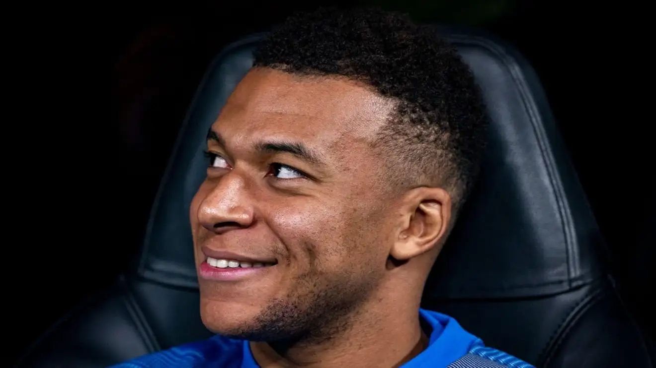 Kylian Mbappe smiling