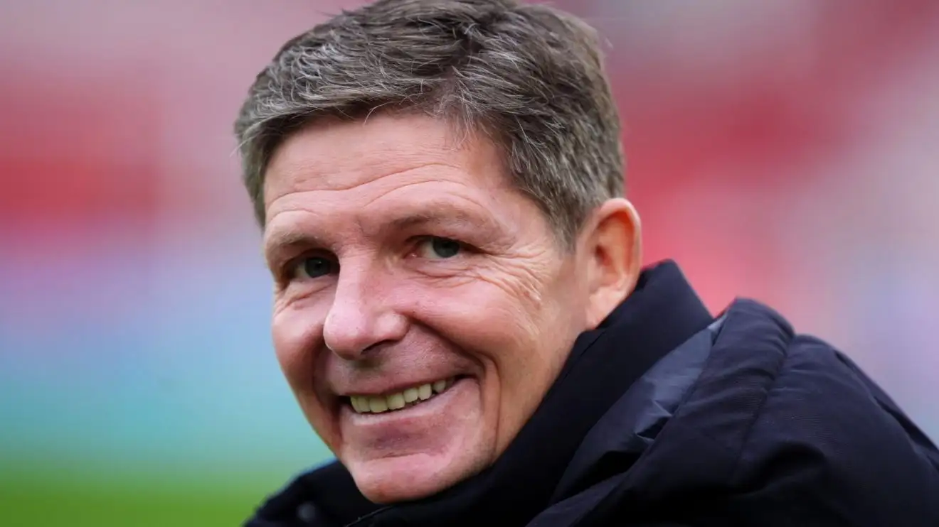 Oliver Glasner smiles at the webcam