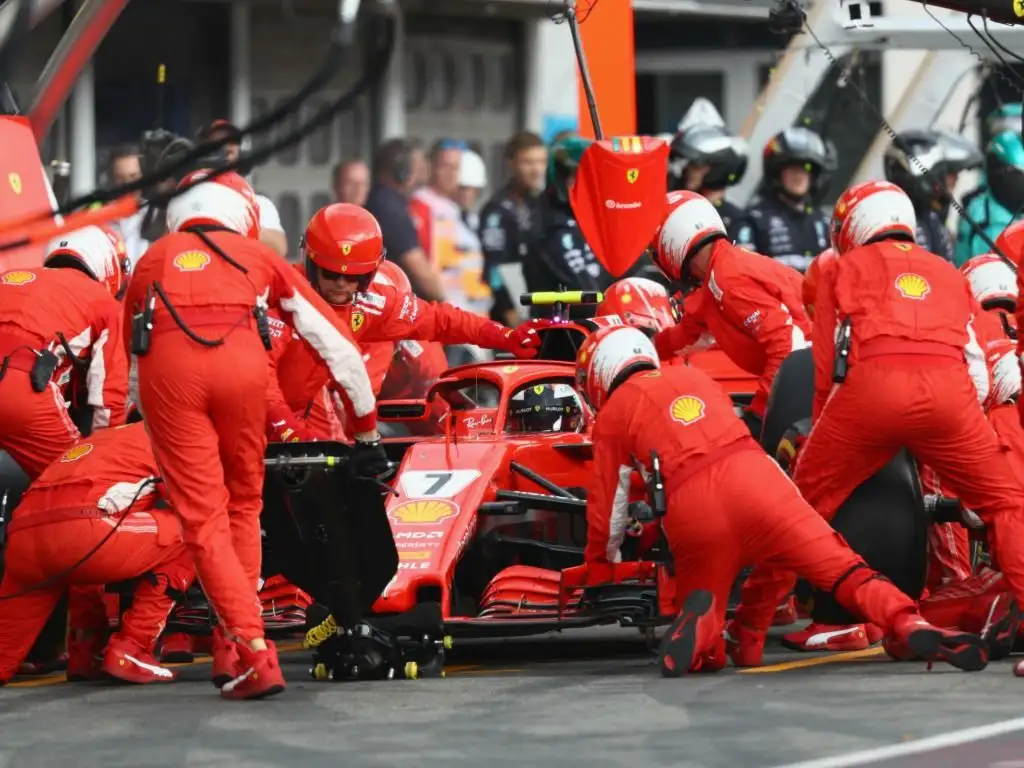 Kimi Raikkonen makes his second stop during Sunday's German GP