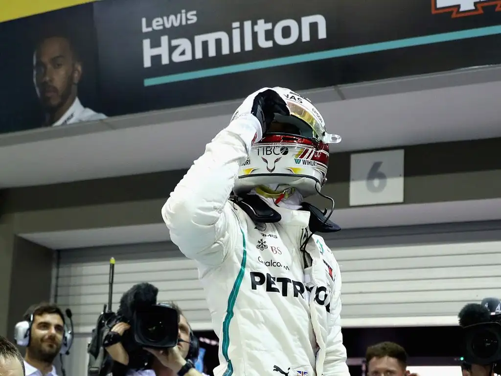 Race: Lewis Hamilton holds off Verstappen for Singapore win