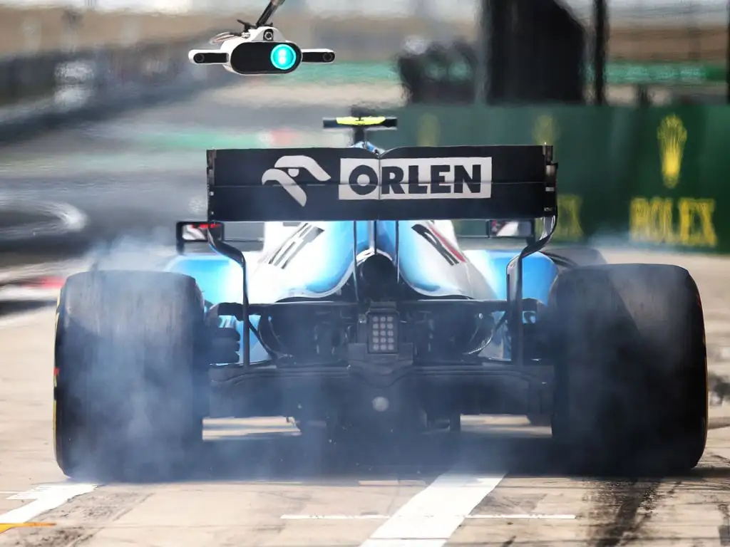 Red flag in FP1 at Azerbaijan GP after George Russell hits a loose drain cover.