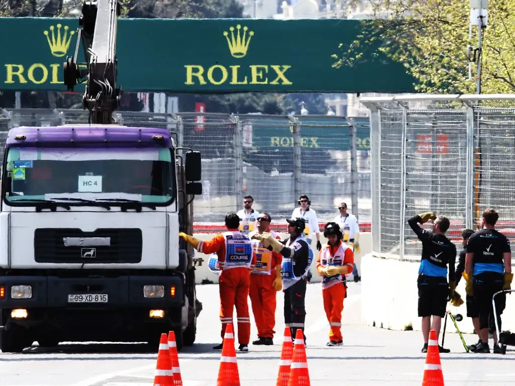 Claire Williams says it is "not acceptable" after a loose drain cover destroyed the underside of George Russell's car in FP1 in Baku.