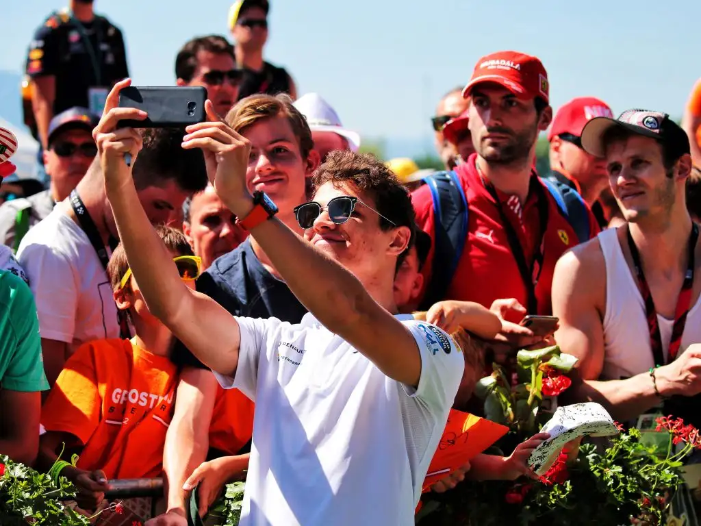 Lando Norris thinks his use of social media gives fans a new insight into F1 behind the scenes.