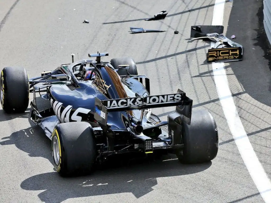 Romain Grosjean crashes in the pit lane during FP1 in Silverstone.