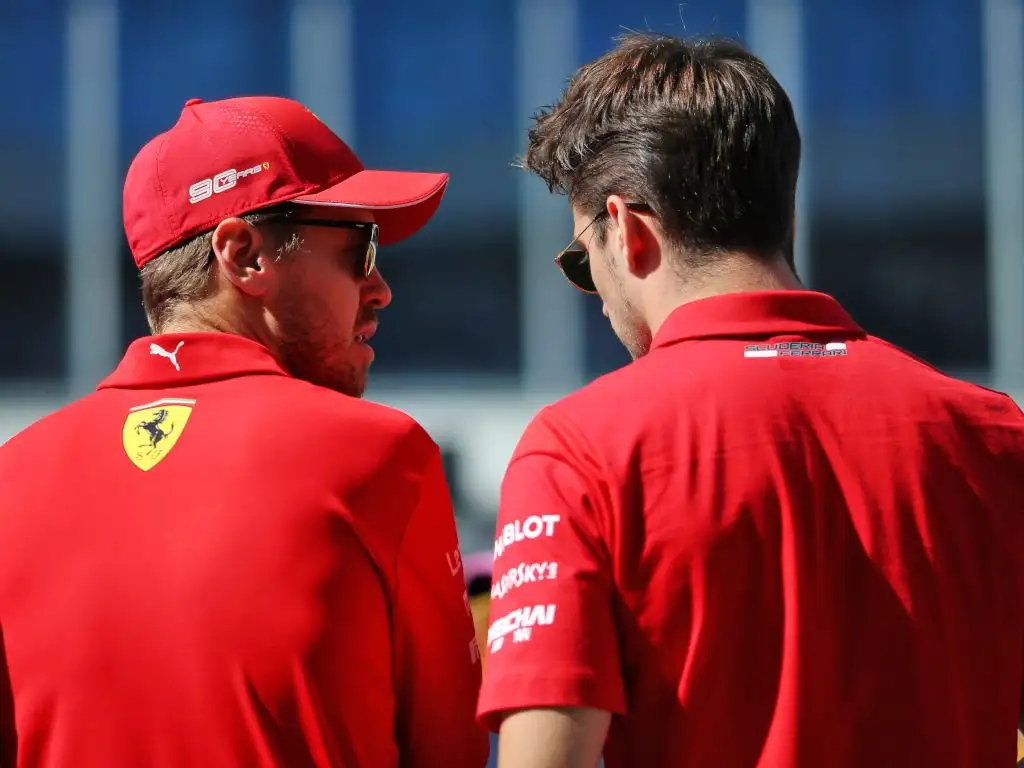 Sebastian-Vettel-speaking-with-Charles-Leclerc-PA
