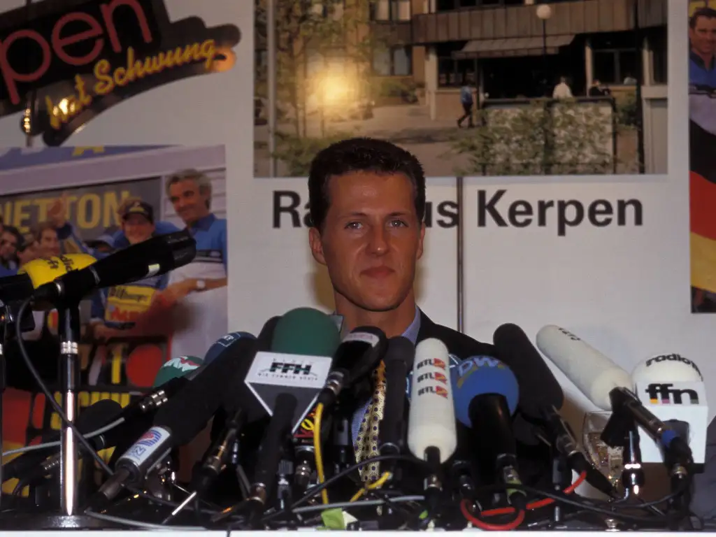 Michael Schumacher talking to the press