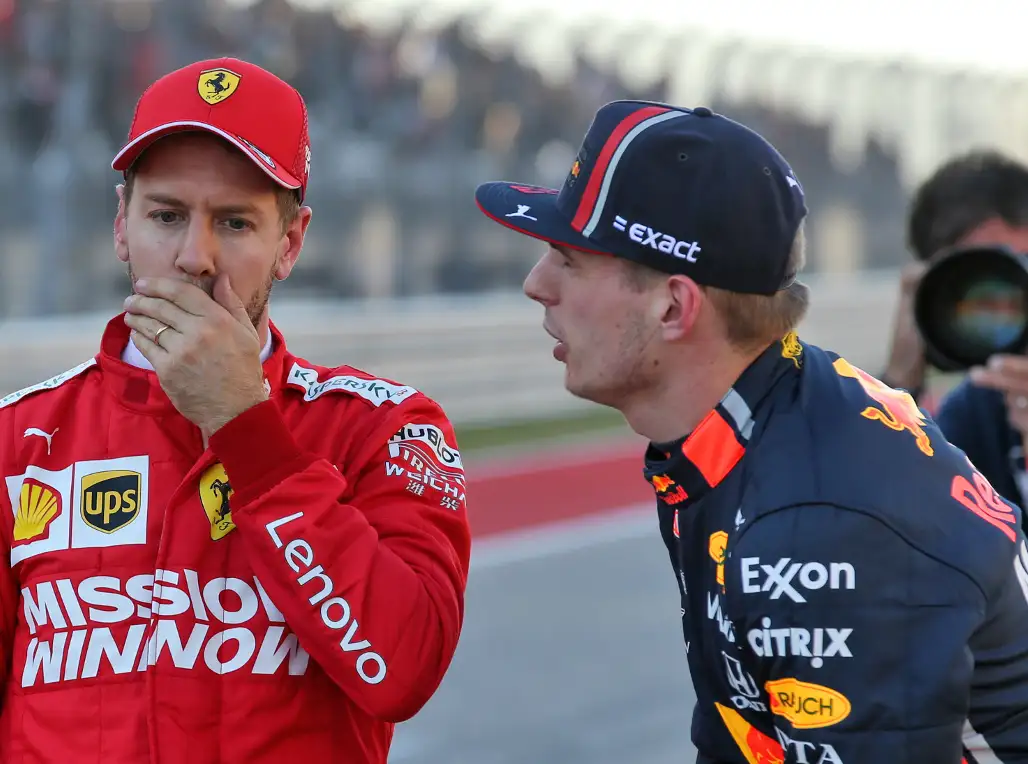 Sebastian-Vettel-hand-over-mouth-and-Max-Verstappen-PA