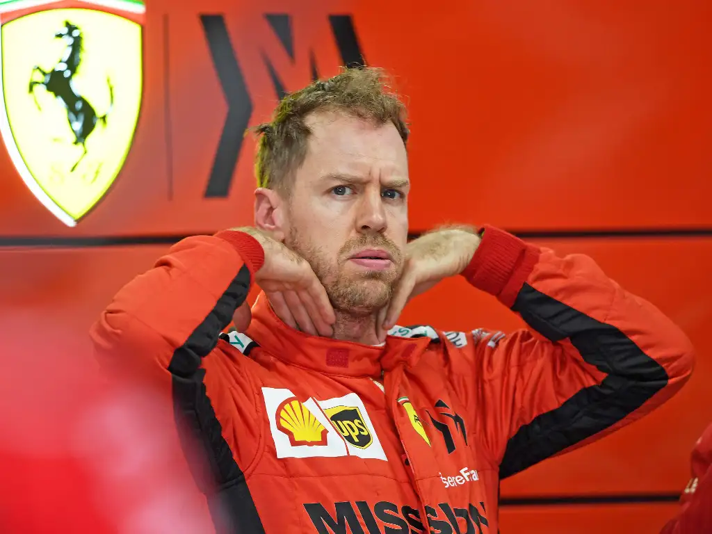 Sebastian-Vettel-garage-looking-stressed