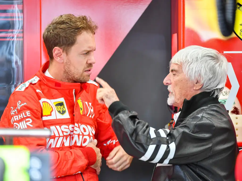 Bernie Ecclestone and Sebastian Vettel pa