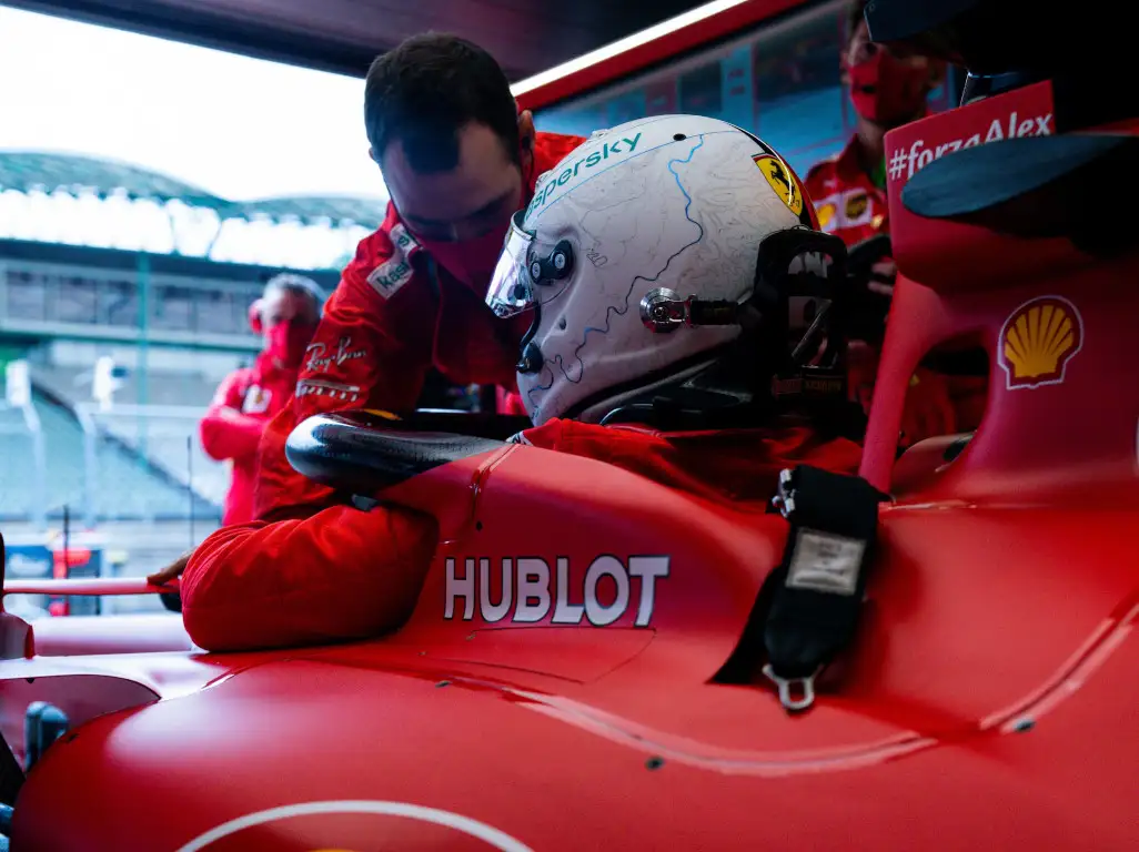 Sebastian Vettel climbs into SF1000